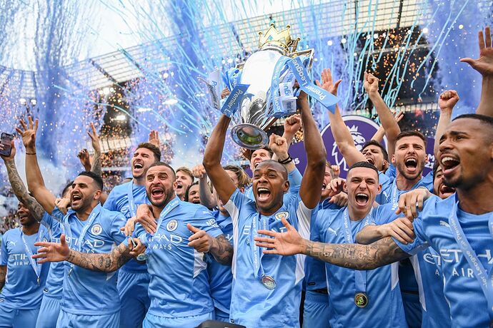 Manchester-City-Football-Club-team-celebrates-with-Premier-League-trophy-championship-May-22-2022